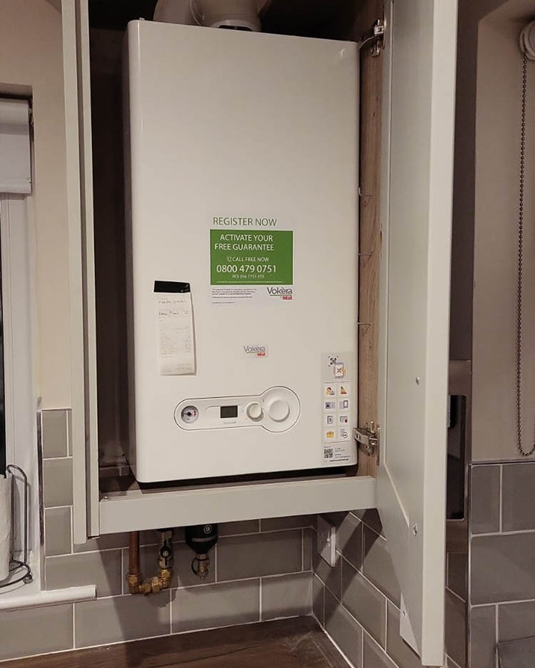 Boiler installation in a cupboard